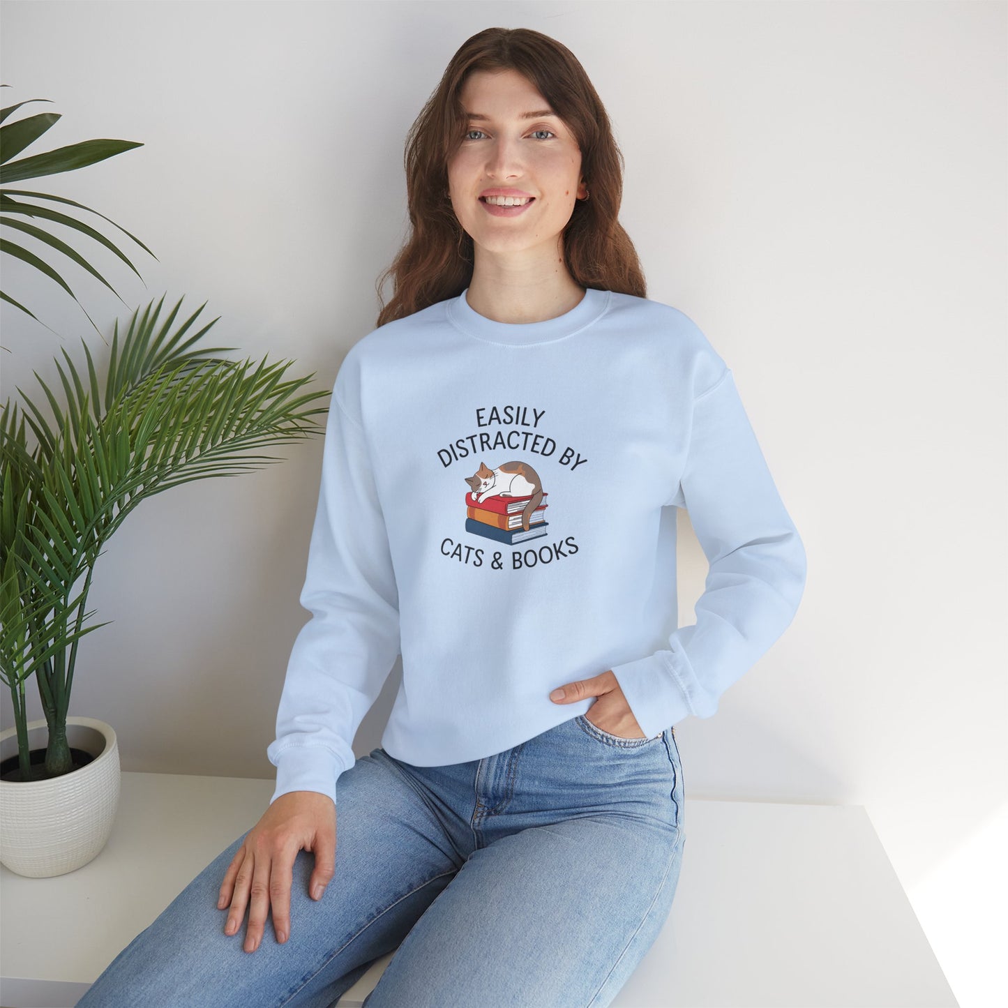 Easily Distracted by Cats & Books, Perfect gift for Cat Lovers and Book Lovers Comfortable Sweatshirt