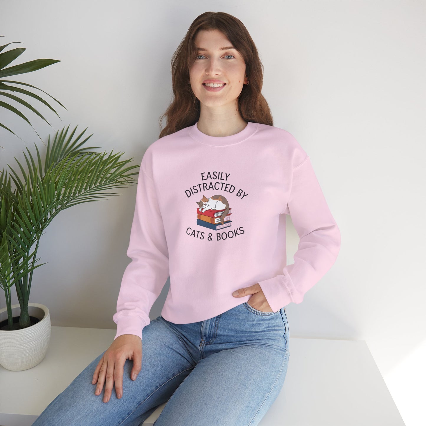 Easily Distracted by Cats & Books, Perfect gift for Cat Lovers and Book Lovers Comfortable Sweatshirt